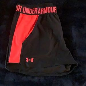 Black and bright orange underarmour shorts